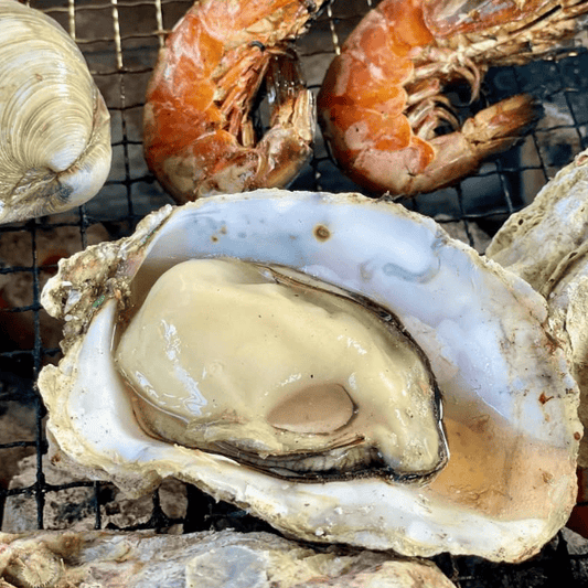能登牡蠣・殻付牡蠣・網焼きの調理例・必ず加熱調理してお召し上がりください。